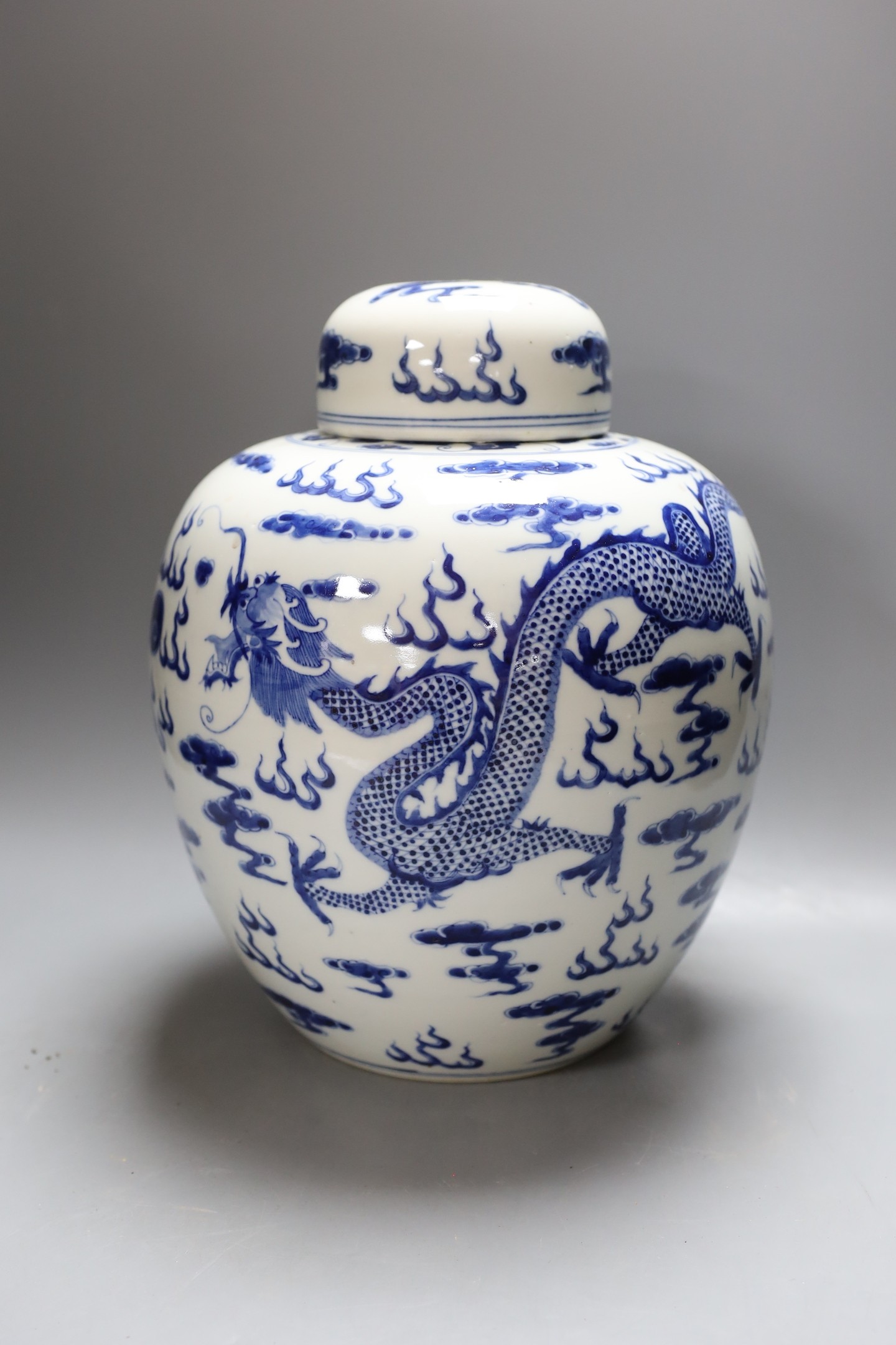 A large Chinese blue and white dragon pattern ginger jar - 34cm tall